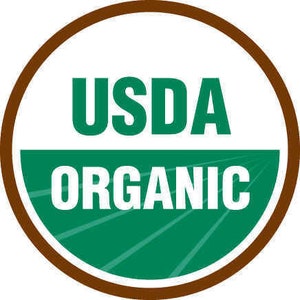Puede incluir: Un c&iacute;rculo marr&oacute;n con fondo blanco y texto verde. El texto dice "USDA Organic".