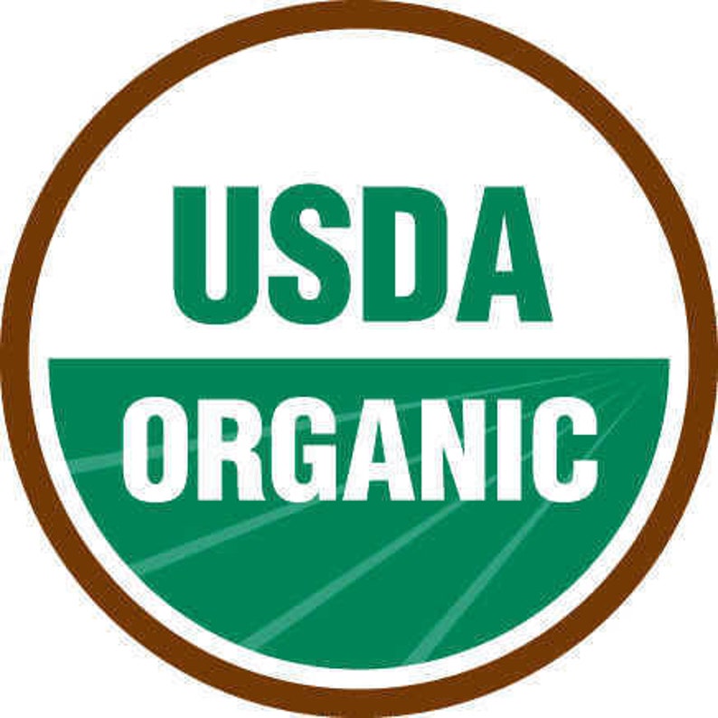 Puede incluir: Un c&iacute;rculo marr&oacute;n con fondo blanco y texto verde. El texto dice "USDA Organic".