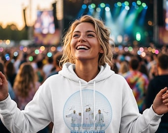 May include: A white hooded sweatshirt featuring a graphic print of a blue wireframe disco ball containing a photograph of a musical group. The text reads Backstreet Boys Millennium Live in Düsseldorf 2025 in blue lettering below the disco ball.