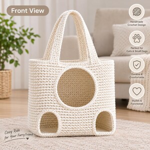 May include: An off-white crochet pet carrier bag featuring a large circular opening in the center and two smaller arched openings at the base. The bag includes two top handles and is constructed with a textured, woven yarn pattern throughout.