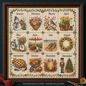 May include: A framed cross-stitch sampler featuring twelve seasonal grid squares labeled January through December. Each square depicts thematic imagery including a snowman, flowers, a bird, a bicycle, beach items, sunflowers, a pie, pumpkins, a lantern, and a nutcracker.