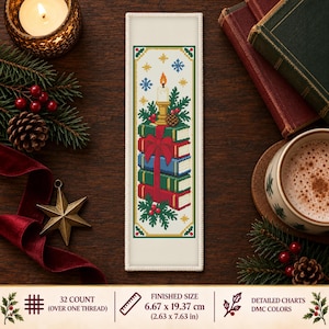 May include: A rectangular cross-stitch bookmark featuring a stack of four books tied with a red ribbon, topped with a lit candle, pine branches, and a pinecone. The design includes blue snowflakes and yellow stars, with a finished size of 2.63 x 7.63 inches.
