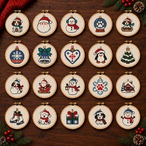 May include: A collection of twenty circular wooden embroidery hoops containing cross-stitch patterns with Christmas themes, including Santa Claus, snowmen, puppies, penguins, a decorated tree, a gift box, ice skates, and snowflakes.
