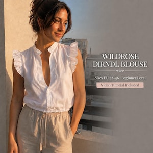 May include: A white sleeveless blouse with ruffled shoulders and a deep V-neckline. The text on the image reads: WILDROSE DIRNDL BLOUSE, Sizes EU 32-46, Beginner Level, Video Tutorial Included. The blouse has a cinched waist and a button-front design.