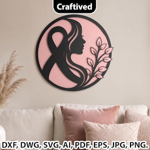 Puede incluir: Una pieza de arte mural circular que presenta una silueta negra de un perfil humano combinada con una forma de cinta y una rama con hojas sobre un fondo rosa suave. El texto Craftived aparece arriba, con formatos de archivo abajo.