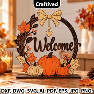 May include: A circular wooden sign featuring the word Welcome in script, decorated with orange and cream pumpkins, maple leaves, and berries. A bow sits at the top with a heart-shaped pendant. The design includes file formats DXF, DWG, SVG, AI, PDF, EPS, JPG, and PNG.