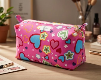 Roze hart make-uptasje: katoenen make-uptasje met ritssluiting.