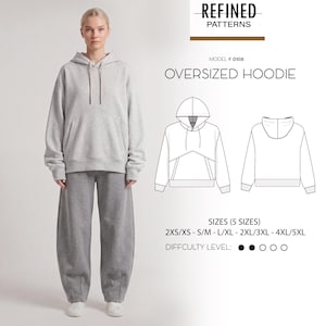 Könnte beinhalten: Ein hellgrauer Oversized-Kapuzenpullover mit Vordertasche und Kapuzenkordel. Das Bild enthält eine technische Strichzeichnung der Vorder- und Rückseite des Hoodies, beschriftet mit REFINED PATTERNS MODEL # 0108 OVERSIZED HOODIE, Größen 2XS/XS bis 4XL/5XL.