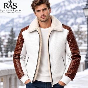 May include: A white jacket with a textured grid pattern, brown crocodile-embossed leather sleeves, and a cream-colored faux shearling collar and lining. The jacket features a front zipper closure and two side pockets. The logo RAS Royal Asian Superior leathers is visible in the top left corner.