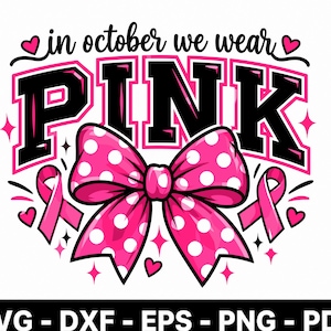 May include: A graphic design featuring the text "in october we wear PINK" in black and pink block lettering. A large pink bow with white polka dots sits below the text, flanked by two pink awareness ribbons, small hearts, and star accents.