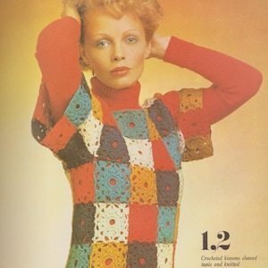 May include: A crocheted kimono-sleeved tunic and a knitted turtleneck pullover in a patchwork design with squares of red, blue, yellow, white, and black. The text "1.2" is printed in black on a white background.