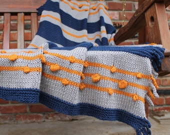 Taggy Wiggly Bobbly:  A Baby Blanket - Knitting Pattern for a modern baby-friendly blanket with lots of things to chew and pull