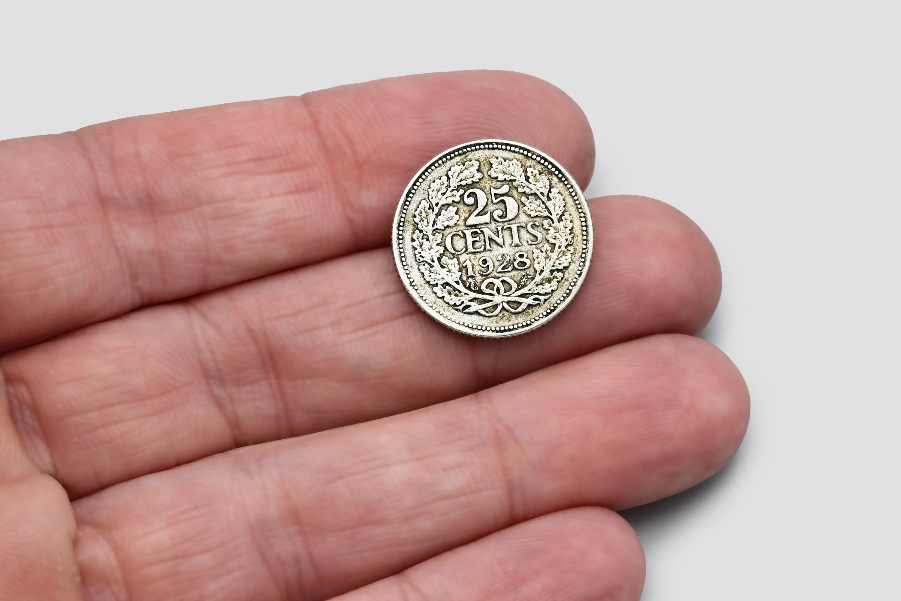 オランダ 25セント硬貨（1928年）、0.640ドル銀貨、ウィルヘルミナ女王