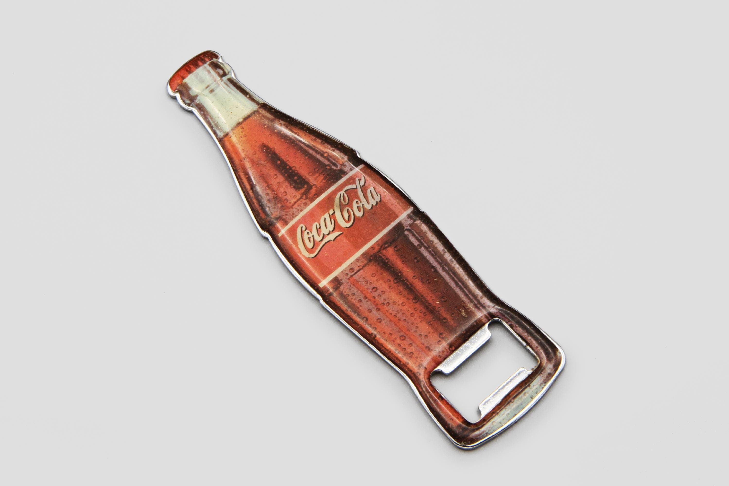 thumbnail interactive-video image 1 of Coca-Cola Sword-Shaped Bottle Can Opener – Collectible Coke Memorabilia 1 of 2
