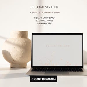 May include: A laptop displaying a digital journal titled Becoming Her, A Self-Love & Healing Journal. The screen shows 32 guided pages as a printable PDF. The text Becoming Her is centered on the screen above a faint floral graphic.