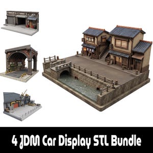 Puede incluir: Una colección de cuatro dioramas en miniatura para exhibición de coches, que incluye una calle junto a un canal con edificios con letreros japoneses, un almacén industrial, una estructura de túnel y un taller con puerta.