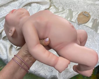 Adorable, realistic baby girl, just like a real baby
