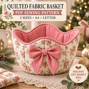 May include: A quilted fabric basket with a floral pattern on the exterior and a pink polka dot interior. The basket features a large pink polka dot bow on the front. Text reads: QUILTED FABRIC BASKET PDF SEWING PATTERN 3 SIZES A4 + LETTER.