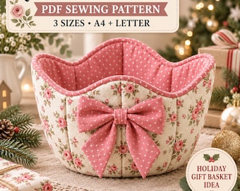 May include: A quilted fabric basket with a floral pattern on the exterior and a pink polka dot interior. The basket features a large pink polka dot bow on the front. Text reads: QUILTED FABRIC BASKET PDF SEWING PATTERN 3 SIZES A4 + LETTER.