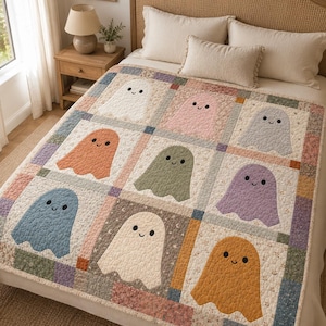 May include: A patchwork quilt featuring nine square blocks, each displaying a solid-coloured ghost with a simple smiling face. The ghosts are in shades of white, pink, grey, orange, green, purple, blue, and gold, separated by floral patterned borders.