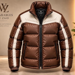 May include: A brown puffer jacket with a high collar, a full-length black front zipper, and white vertical stripes running down the sleeves and across the chest. The interior label displays the text Wearables by Zaid, and the logo is visible.