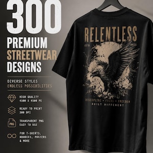 Op de afbeelding: Een zwart t-shirt aan een hanger met een afbeelding van een adelaar voor een cirkelvormige achtergrond en de tekst RELENTLESS, ESTD, MMXX, DISCIPLINE, FOCUS, FREEDOM en BUILT DIFFERENT. De afbeelding bevat de tekst 300 PREMIUM STREETWEAR DESIGNS.