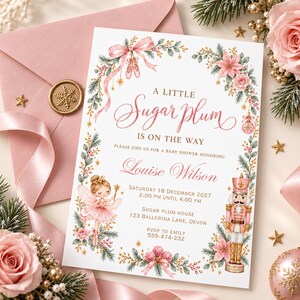 Könnte beinhalten: Eine weiße, rechteckige Einladungskarte für eine Babyparty mit einer rosa Ballerina, einem Nussknacker und floralen Grünrändern. Der Text lautet: A LITTLE Sugar Plum IS ON THE WAY, PLEASE JOIN US FOR A BABY SHOWER HONORING Louise Wilson, SATURDAY 18 DECEMBER 2027, 2:00 PM UNTIL 4:00 PM, SUGAR PLUM HOUSE, 123 BALLERINA LANE, DEVON, RSVP TO EMILY 555-474-232.