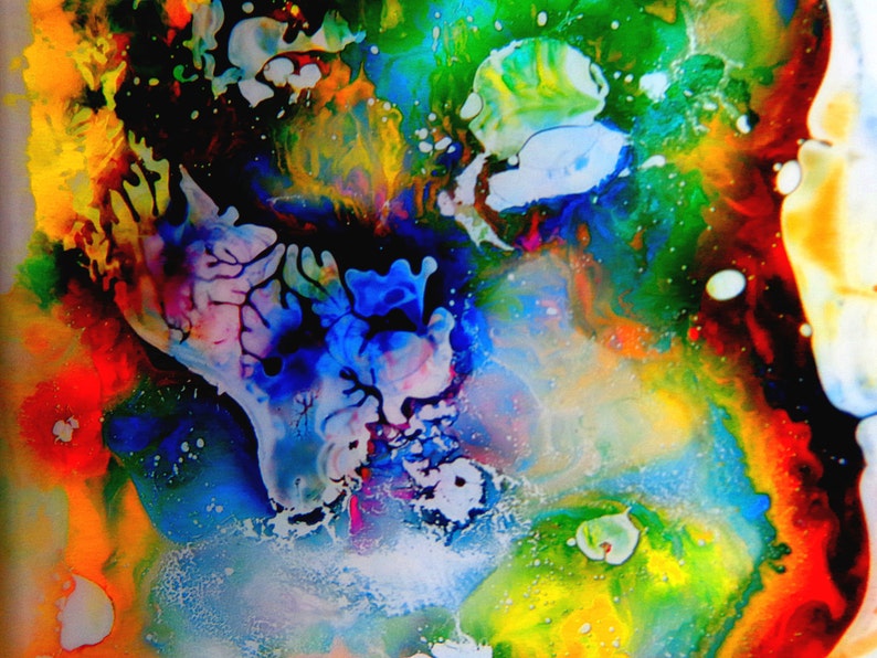 May include: Abstract painting with vibrant colors, including red, orange, yellow, green, blue, and purple. The colors are blended and swirled together, creating a dynamic and energetic composition.