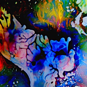 May include: Abstract art painting with vibrant colors, including blue, red, yellow, green, and white. The paint appears to be swirling and flowing, creating a dynamic and energetic composition.