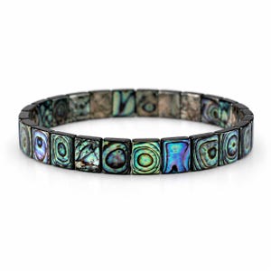 May include: A stretch bracelet composed of rectangular abalone shell tiles. Each tile features a unique, iridescent pattern with swirling hues of deep blue, vibrant green, and purple, set against a dark, polished background finish.