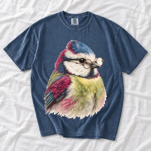 Colored-pencil blue tit bird wearing tiny round reading glasses, funny birdwatcher t-shirt illustration