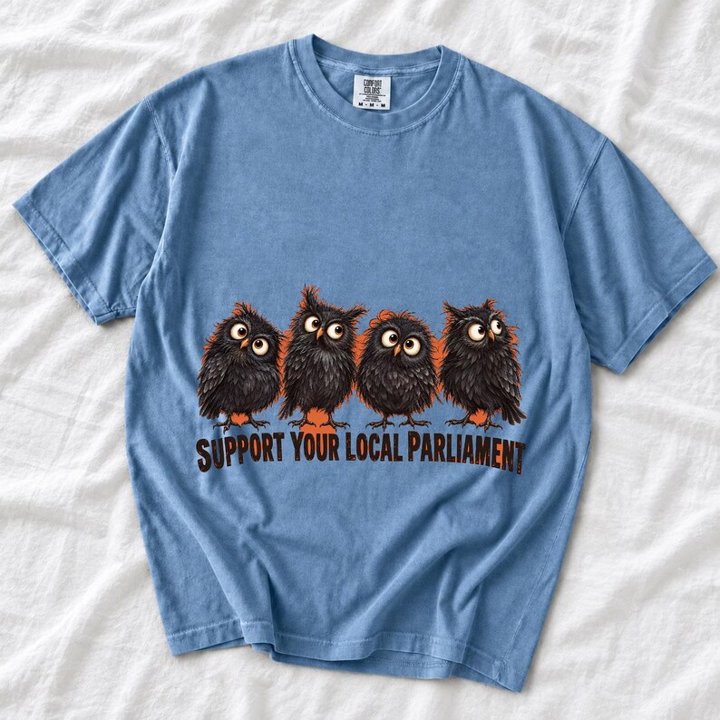 Four fluffy big-eyed black owls in a row with the text "Support Your Local Parliament"