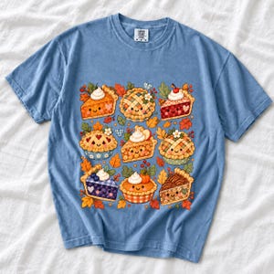 Grid of cute pie slices and mini pies with faces, lattice crusts and autumn leaves in patchwork sticker style