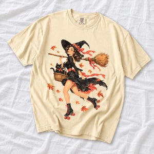 Retro 1950s pin-up witch on roller skates with a broom and a cat in a basket, autumn leaves