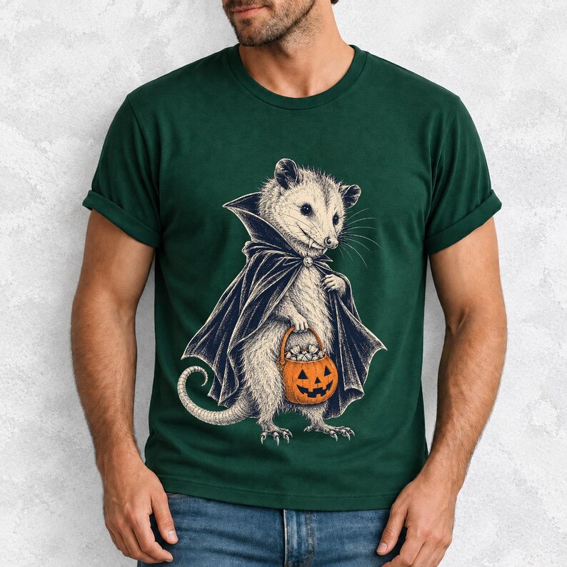 Etched pen illustration of an opossum in a vampire cape holding a candy pumpkin, bone white with orange accent