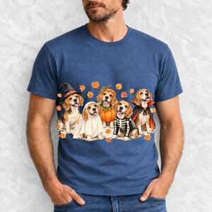Five watercolor beagles in witch, ghost, pumpkin, skeleton and vampire costumes with floating autumn leaves