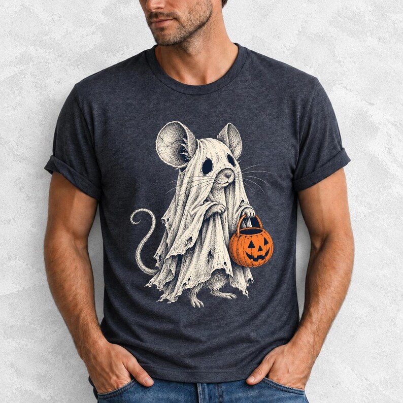 Etched pen illustration of a small mouse in a sheet ghost costume holding a candy bucket, bone white with orange accent