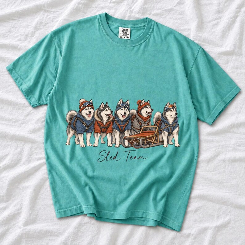 Illustrated huskies in ski gear lined up with a sled, text Sled Team