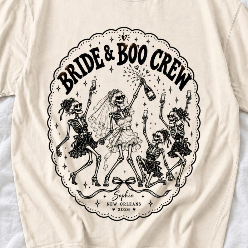 Skeleton bride popping champagne with cheering skeleton bridesmaids and the text Bride & Boo Crew
