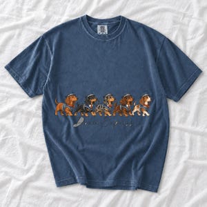 Illustrated dachshunds in conductor hats lined up like a train, text Doxie Express