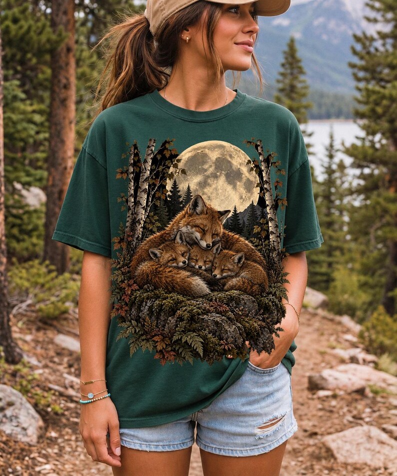 Fox family curled on a rock under a huge full moon among birch trees, dark realistic woodland illustration