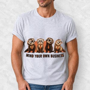 Four ferrets in tiny ties in a row with the text "Mind Your Own Business"