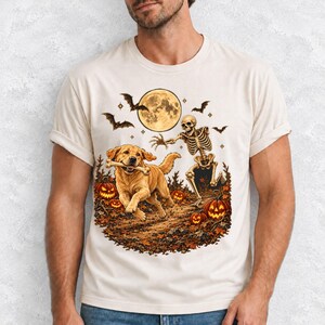 A skeleton chasing a golden labrador that stole its arm bone under a full moon with jack o lanterns and bats