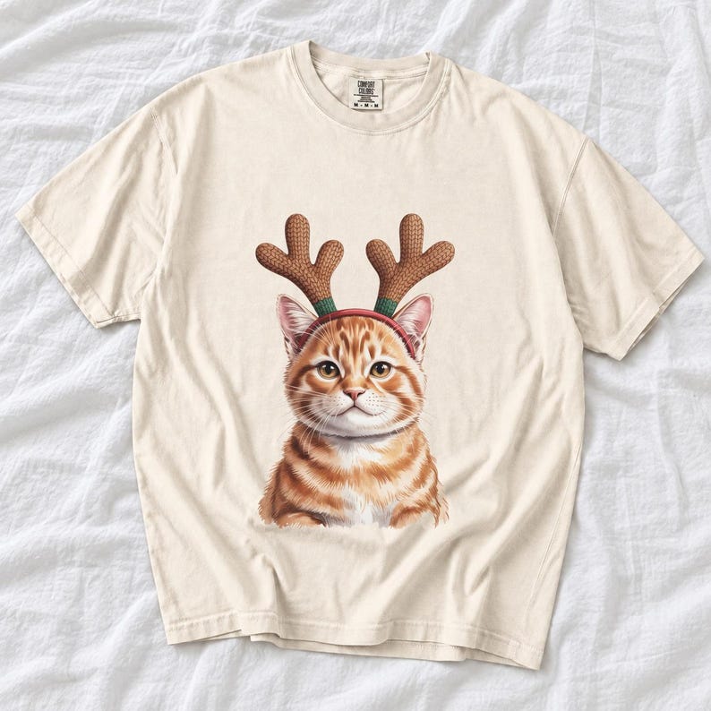 Comfort Colors Cat Reindeer Antlers Shirt, Orange Tabby Cat Christmas Tee, Grumpy Cat Reindeer T-shirt, Cat Mom Holiday Shirt, Cat Xmas Tee