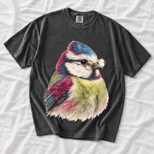Colored-pencil blue tit bird wearing tiny round reading glasses, funny birdwatcher t-shirt illustration