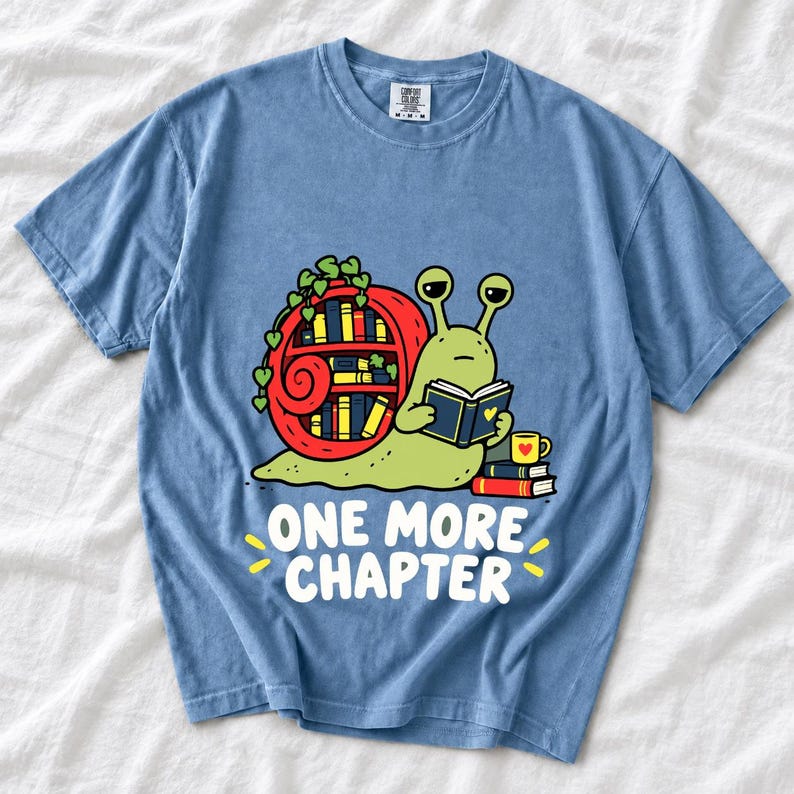 Cartoon snail reading a book with a bookshelf shell and the text One More Chapter