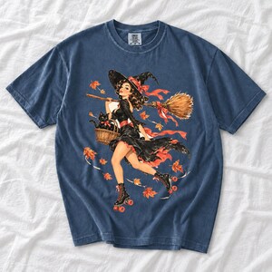 Retro 1950s pin-up witch on roller skates with a broom and a cat in a basket, autumn leaves