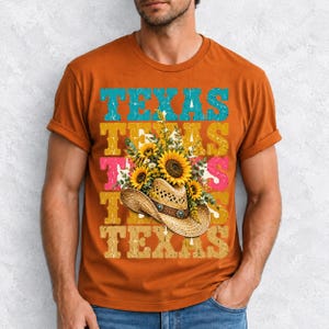 Straw cowboy hat full of sunflowers over a five-line stacked TEXAS word in retro western colors