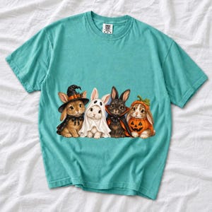 Realistic illustration of four bunnies in witch, ghost, vampire cape and pumpkin costumes in a row