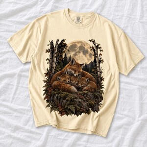 Fox family curled on a rock under a huge full moon among birch trees, dark realistic woodland illustration